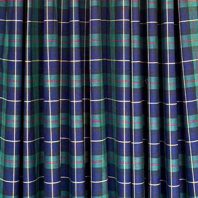 A pair of custom made two-width curtain panels in Ralph Lauren style wool-blend tartan plaid; each lined and interlined,...