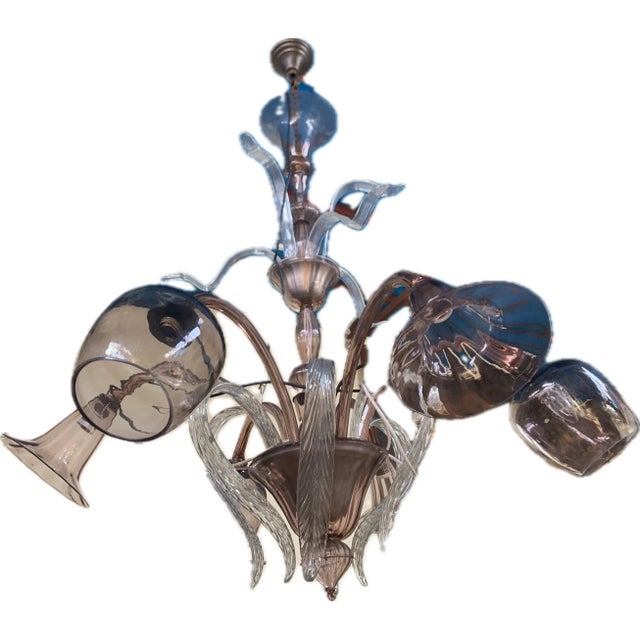 Huge Murano chandelier. Made on the Venetian island in Italy. Murano blown glass. I think these 3 baskets are from another...