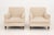 Pair of Edward Ferrell Beige Upholstered Arm Chairs, on mahogany turned wood legs, the front on casters, with "Edward...