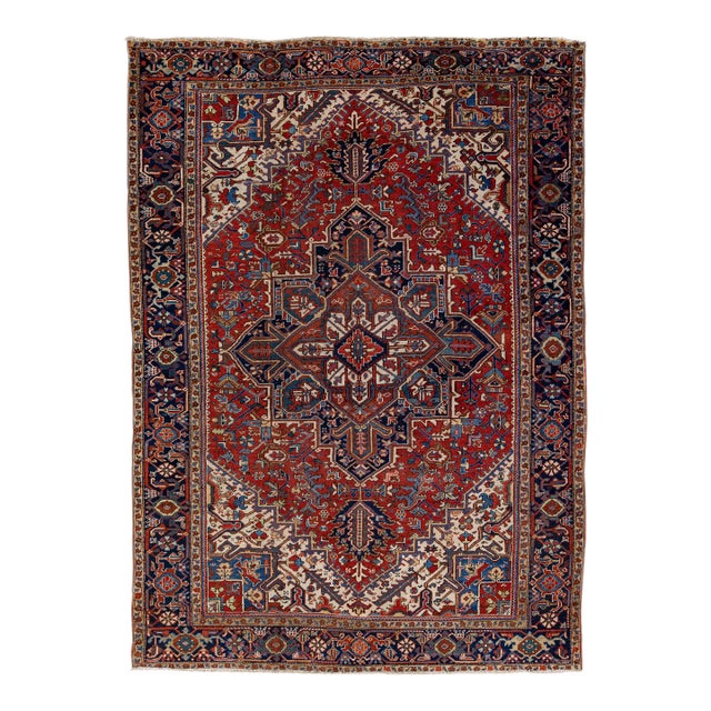 Antique Heriz Red Handmade Persian Wool Rug With Multicolor Medallion Design For Sale