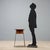 1960s cabinet featuring brass legs that add a touch of elegance and a teak top, ideal for displaying small objects or...