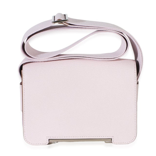 Item #: 154129 Features Interior: Three slip pockets Dimensions: 7.75 x 5.5 x 2.5 in Handbag Closure Type: Magnetic Strap...