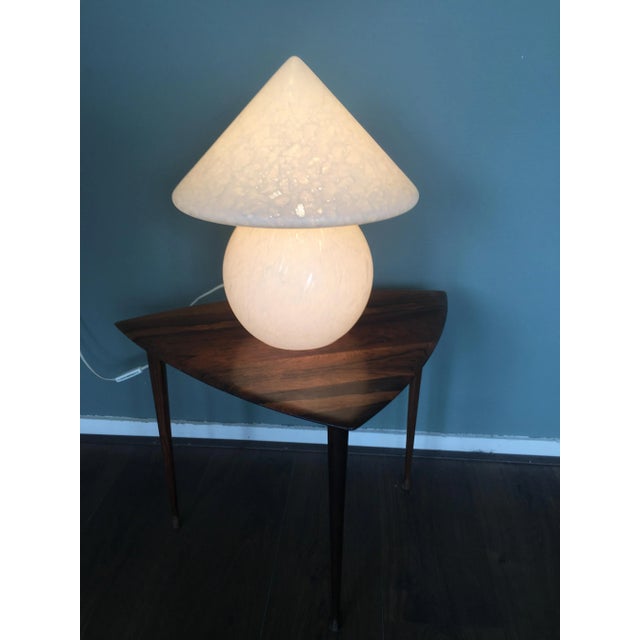 This vintage glass table lamp was produced by Peil & Putzler. Labeled by Maker, Up to 250V (Europe/UK Standard).The wiring...