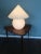 This vintage glass table lamp was produced by Peil & Putzler. Labeled by Maker, Up to 250V (Europe/UK Standard).The wiring...