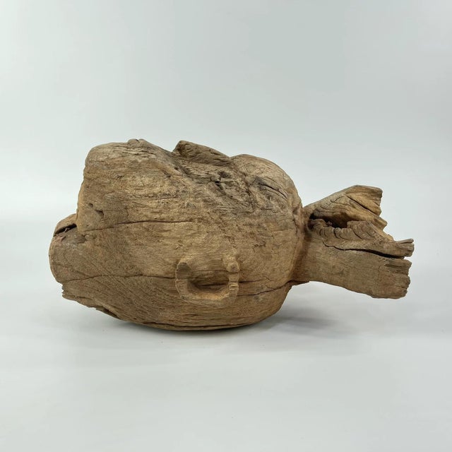 This carved wooden memorial head originates from the Bongo people of southern Sudan and may date from the 19th century or...