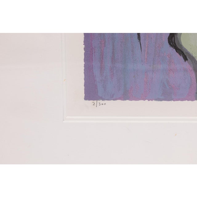 A contemporary serigraph in colors on paper titled "Temptation' by Israeli artist Itzchak Tarkay. Hand signed in pencil on...