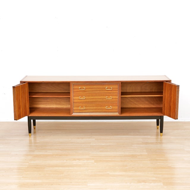 This vintage credenza is a beautiful example of E Gomme's Librenza range by E Gomme (G Plan). Produced in the early 1960s...