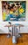 Measuring an impressive 48” x 60”, this commanding 2007 original oil on canvas titled “Postcard from Florida (Wish You...