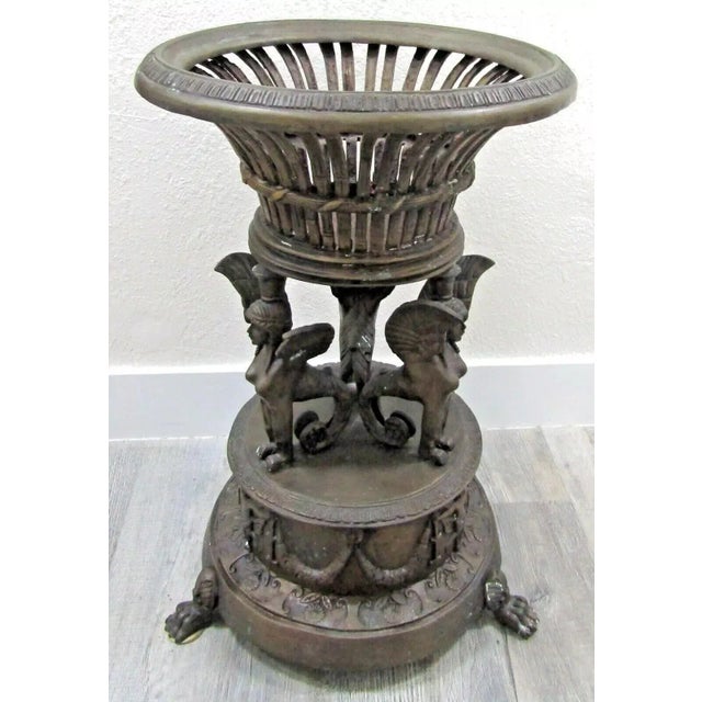 French Empire Style Bronze Jardiniere with Female Griffons and Cherubs 30.5" Tall Early 20th century, pierced flared...