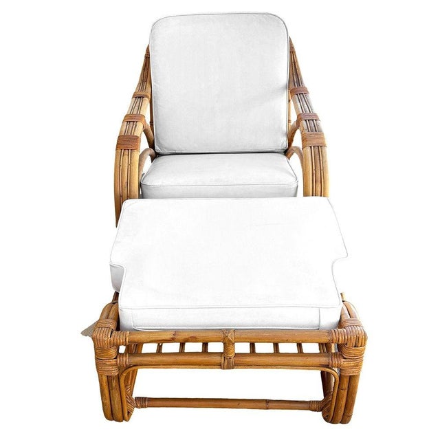 Original Mid-Century Paul Frankl-style six-strand square pretzel rattan chaise lounge featuring a large lounge chair with...