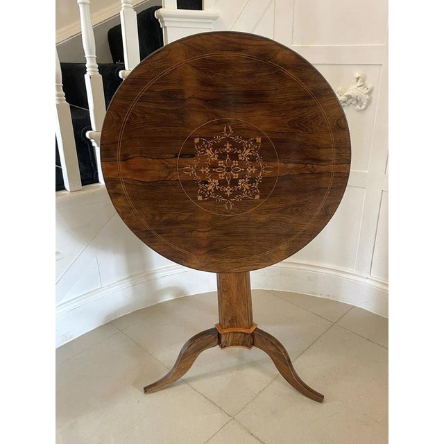 Outstanding quality antique rosewood inlaid circular lamp table having a superb quality rosewood circular top with...