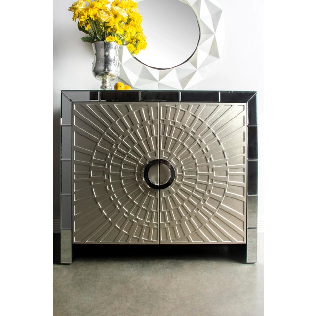 New 2 door cabinet. It has one shelf in the middle of the cabinet, the distance between shelves is 12". More than 1...