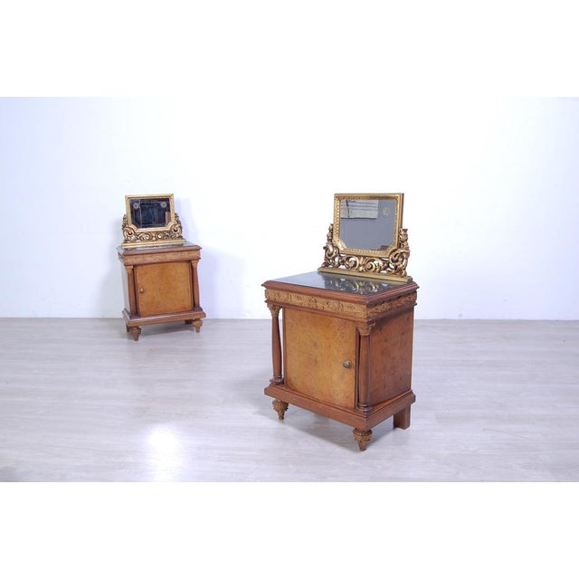 Pair of bedside tables produced in the 1930s-1940s, in late Art Nouveau style. Structure in burl wood, decorative side...