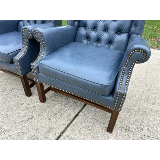 Wood Mid-Century Chesterfield Wingback Chairs, a Pair - Tufted Blue Faux Leather With Nailhead Detailing For Sale - Image 7 of 11