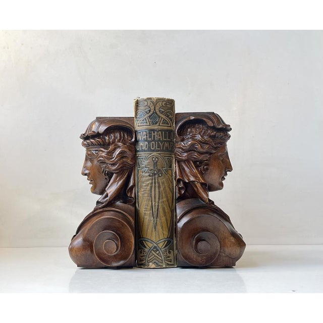 A set of exceptionally well-made mahogany bookends depicting bare-breasted Venus. It does not take much to see that these...