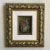A small and incredibly beautiful late-20th century floral oil-on-board still life presented in a gilded carved wood frame....