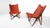 Pair of Red Tripolina Folding Chairs by Joseph B. Fenby This piece is attributed to the mentioned designer/maker. It has...