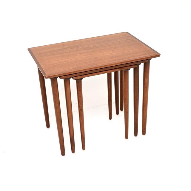 A smart and very stylish Danish vintage teak nest of three tables. This model is attributed to H.W Klien for Bramin, they...