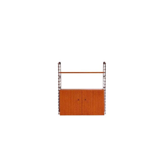 This vintage modular wall system Musterring that great design isn’t about size. In this compact version, the essence of...