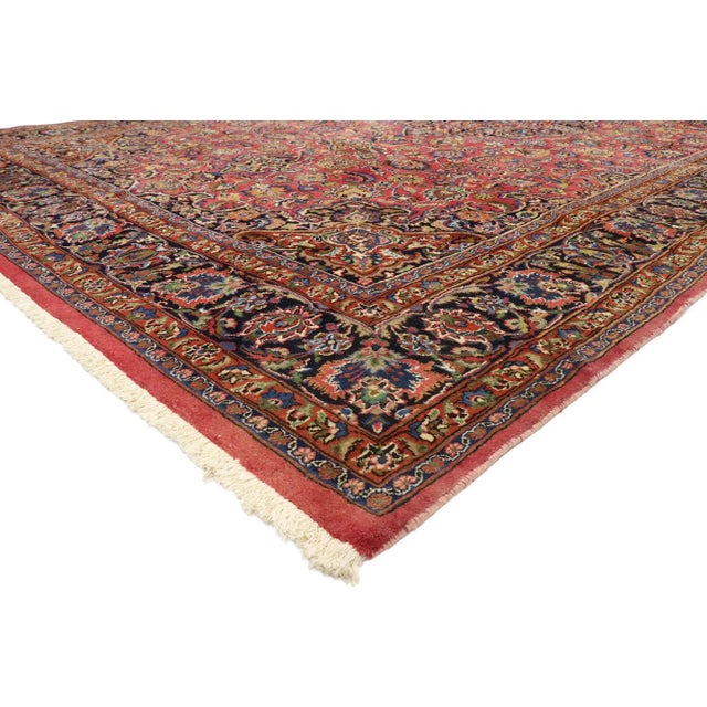75202 Vintage Persian Mashhad Rug, 09'06 x 16'00. Rich in color, texture and beguiling ambiance, this hand-knotted wool...