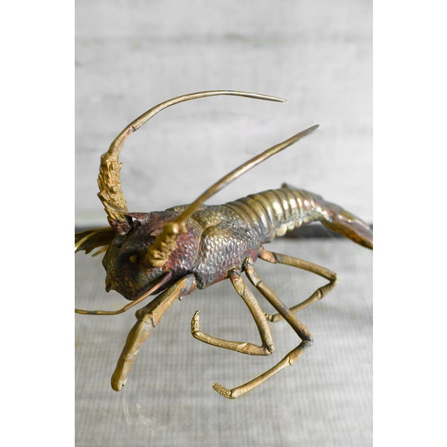 Brass Lobster, 1970s Product Details Handcrafted with embossing and chiseling techniques. Dimensions: 31 W x 25 H x 47 D cm