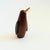 A mid century turned wood figurine in the shape of a Penguin. Adorable stylized features. Made in Japan by Senshukai as...