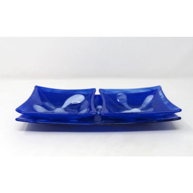 A set of blue and white fused glass stackable relish trays. Can be used for condiments, sandwiches, appetizers, veggies,...