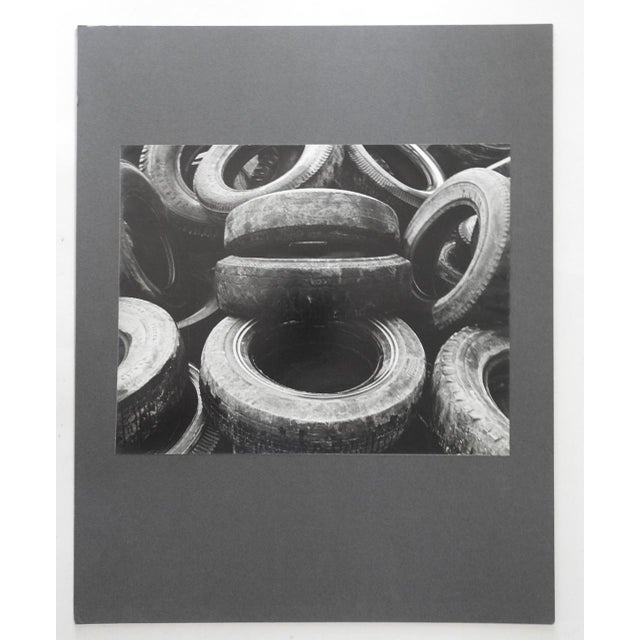 Vintage late 20th century abstract photograph of tires. Signed faintly LInda Loomis in pencil along backing edge....