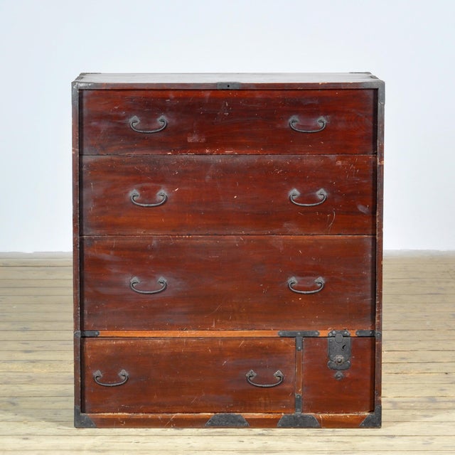 Traditional Japanese Tansu chest of drawers from the 1890s. Manufactured during the late Meiji era (1868-1912). This piece...