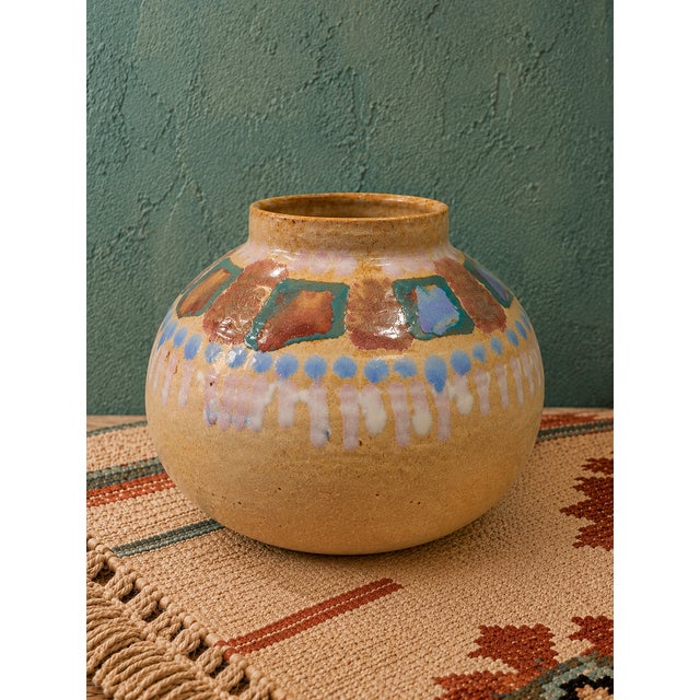 Discover this stunning Vintage Lisa Koch studio pottery vase, featuring a rounded sculptural form and colorful abstract...