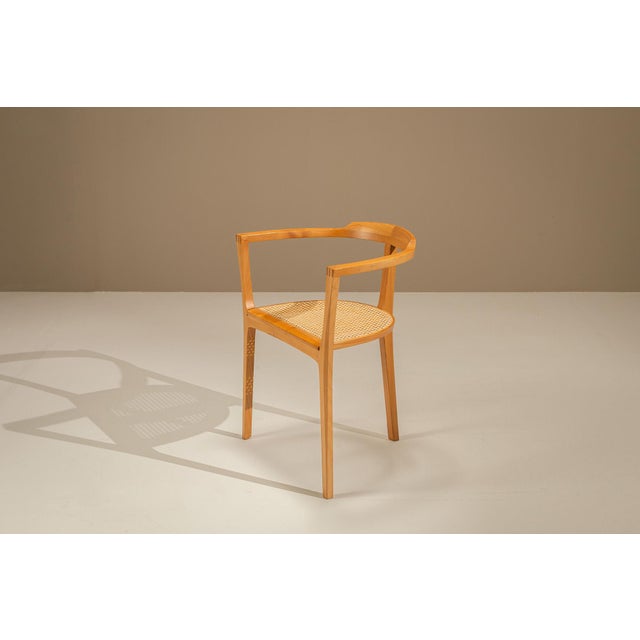 A sculptural three-legged chair by German woodworker Xaver Seemüller, believed to date from the 1960s or 1970s. The design...