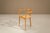 A sculptural three-legged chair by German woodworker Xaver Seemüller, believed to date from the 1960s or 1970s. The design...