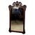 Large antique wall mirror featuring an elaborately hand-carved frame with exceptional decorative detailing. The mirror is...