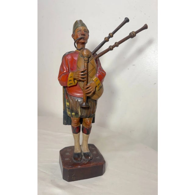 This rare early 20th century antique hand carved wood, German whistler sculpture is a unique and charming collectible...
