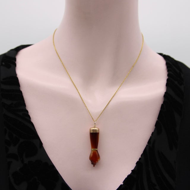 Circa the 1920’s, this agate Figa is beautifully carved with 9k gold detailing and a 14k gold bail. The agate ranges in...
