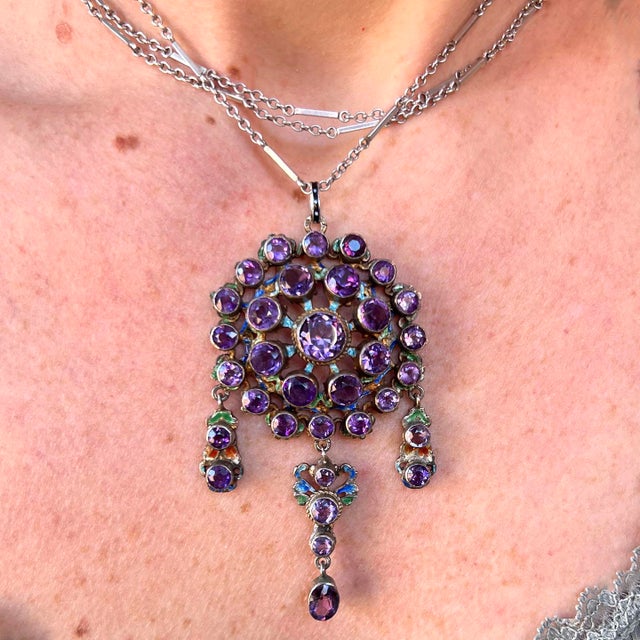A relic of an empire, rich with the romance of Old Europe. This Austro-Hungarian pendant is a symphony of royal purple...