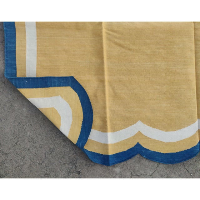 Handmade Cotton Vegetable Dyed Scalloped Edge Rug Yellow With Teal Blue Border - 6x9 For Sale - Image 10 of 11