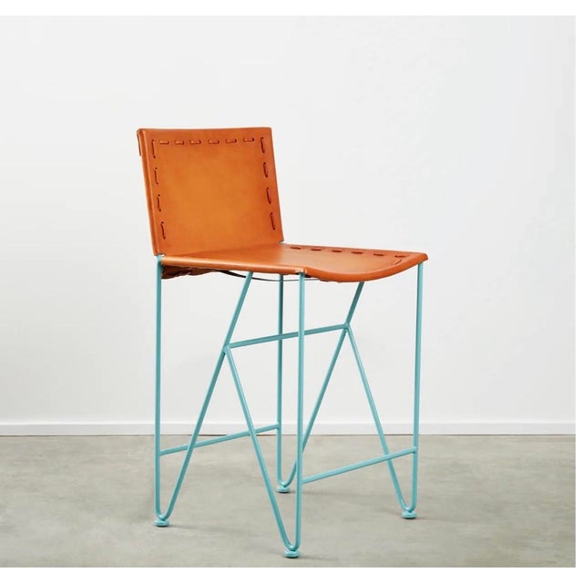Set of Handcrafted Saddle Leather Stools from Garza Marfa, the celebrated Texas design studio renowned for blending...