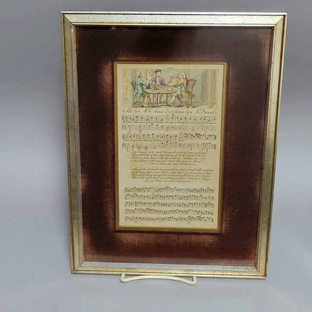 A pair of late 18th-century English hand-tinted engraved music sheets, circa 1780, combining engraved musical notation and...