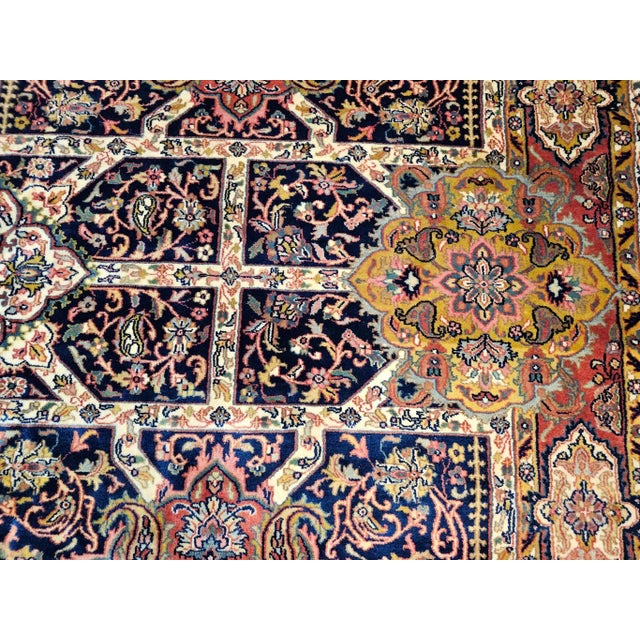 A handsome vintage Kerman-style room-size rug dating from the late 20th century, this piece draws its inspiration from the...