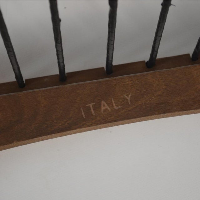 Elegant Italian Mid-Century armchair in the scandinavian style from the 1960s, crafted in beech and newly reupholstered in...