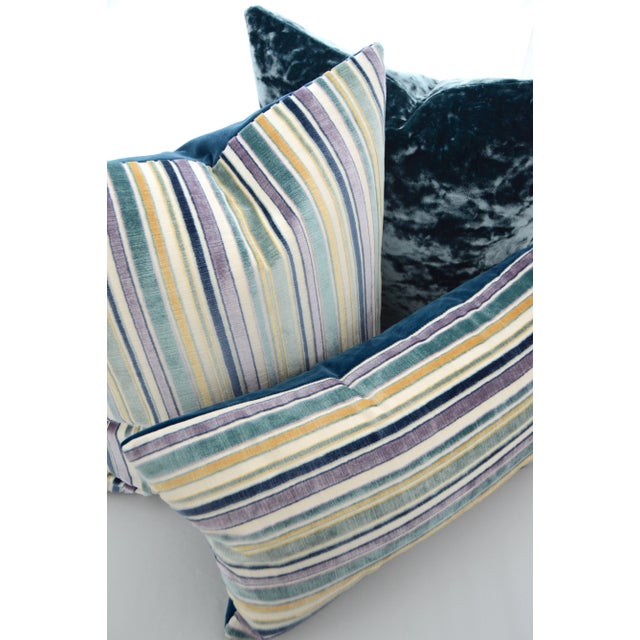Modern and elegant colorful Blue striped velvet pillow. Available in two color combinations: Coral Pink/Acid Green and...