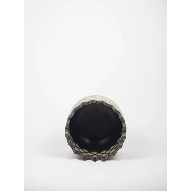 The Rombi collection was born from the observation of the typical "Tunisian stitch", traditional crochet work; it is a...