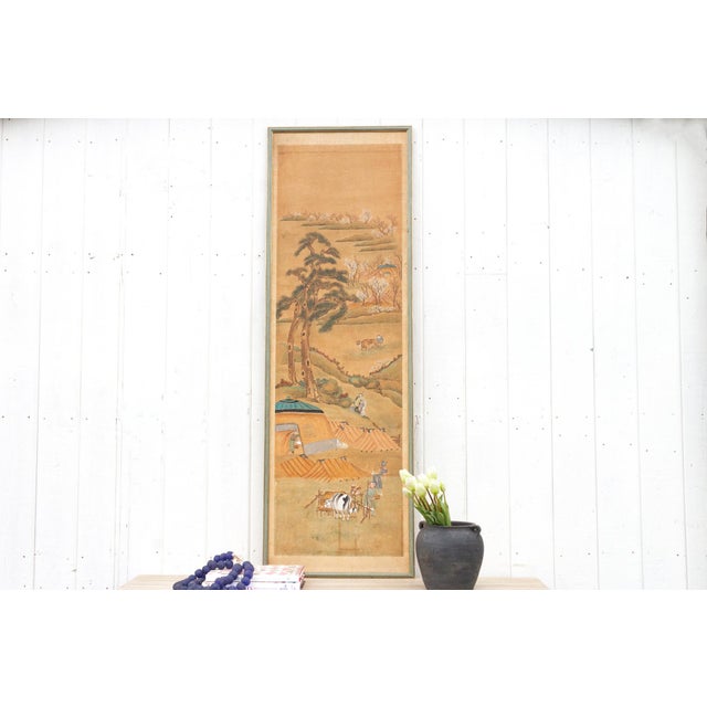 Transport yourself to the tranquil countryside of ancient China with this antique landscape painting. Believed to be from...