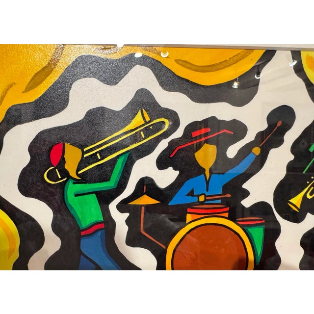 Happy energetic beats that move bodies to want to dance. Caribbean musical group is jamming with a drum, a trombone and a...