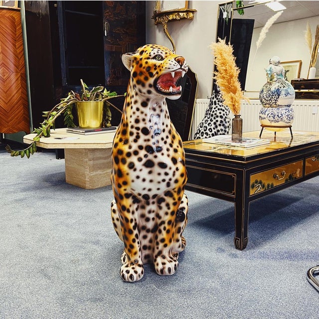 Unique handmade statue of a leopard. This Hollywood Regency statue, crafted from hand-painted ceramic and made in Italy,...
