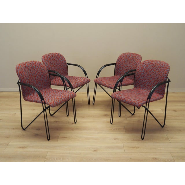 The set of four chairs was made in the 1980s, Italian production. The structure is made of metal. The chairs have original...