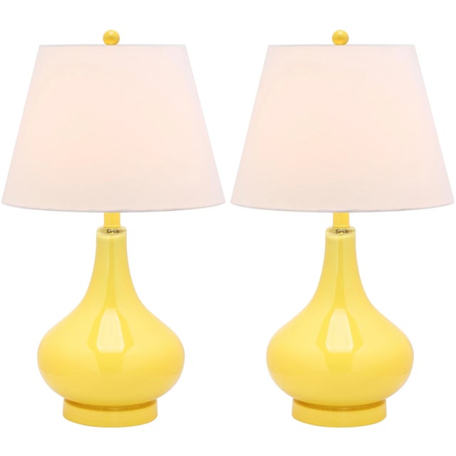 Reflect a aura of sophistication with the glimmering yellow Gourd Glass Lamp with matching finial, base and neck....