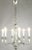 Silver-plated six-arm Regency chandelier from Lightolier. Certain characteristics are similar to the design elements of...