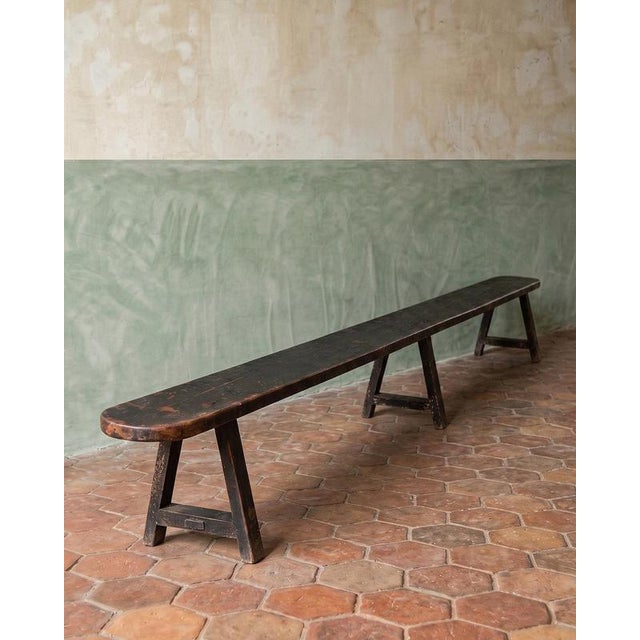 Stretching an impressive 3.35 metres, this 19th-century antique French bench was clearly built with a purpose. Its...